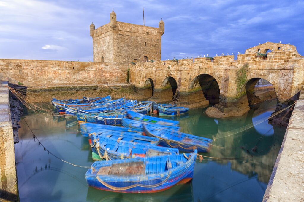 Morocco, Essaouira, blue fishing boats in the harbour